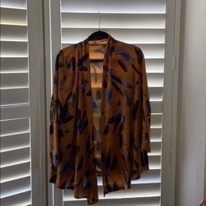 Unique vintage plush cardigan with sequined elbow